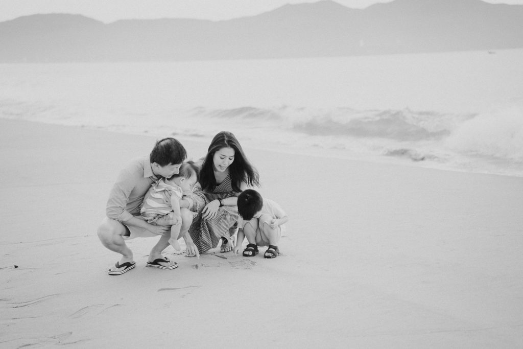 Candid family picture on the beach
