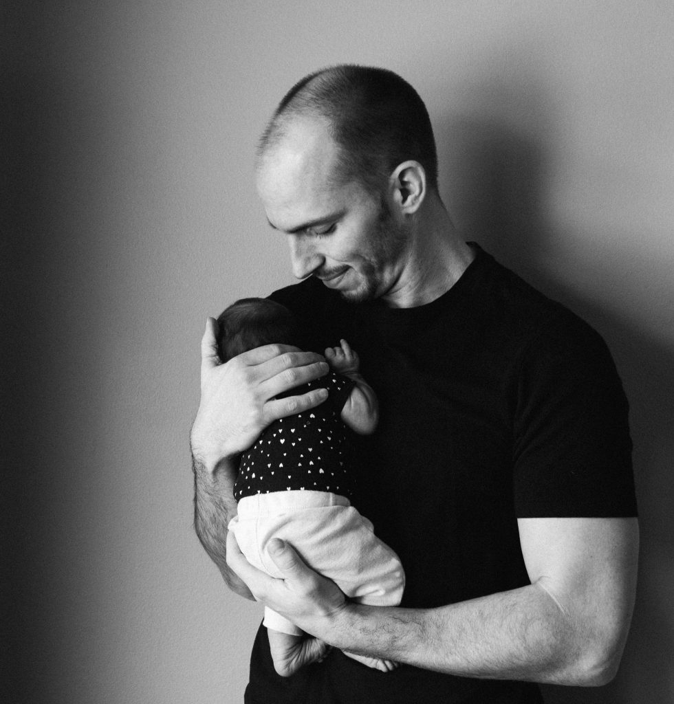 Father holding baby