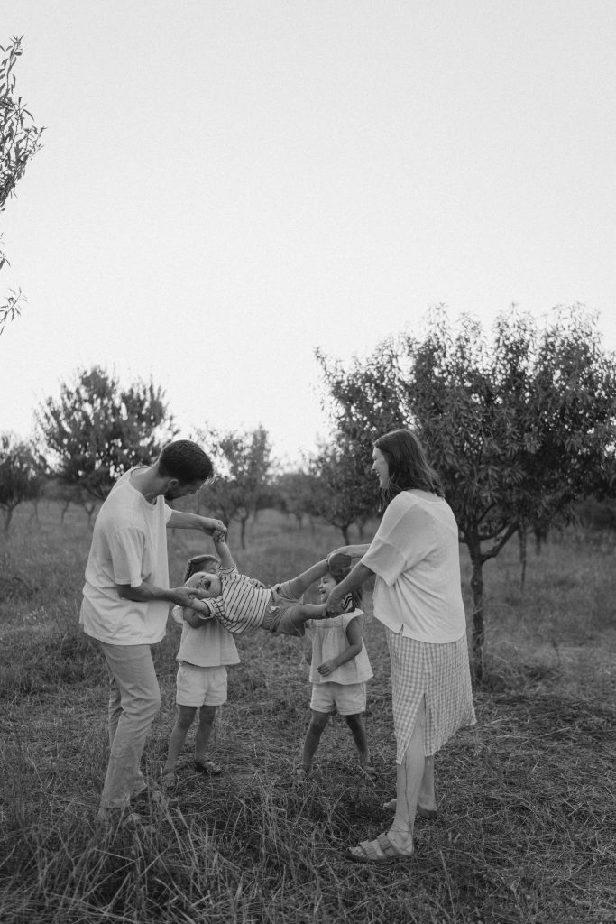 Black and white family picture outdoors